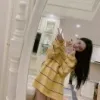 哦